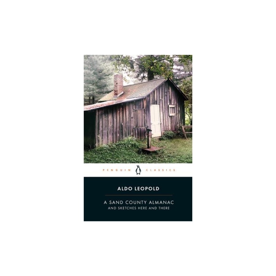 Book cover with rustic cabin, trees, and text 'A Sand County Almanac' by Aldo Leopold.