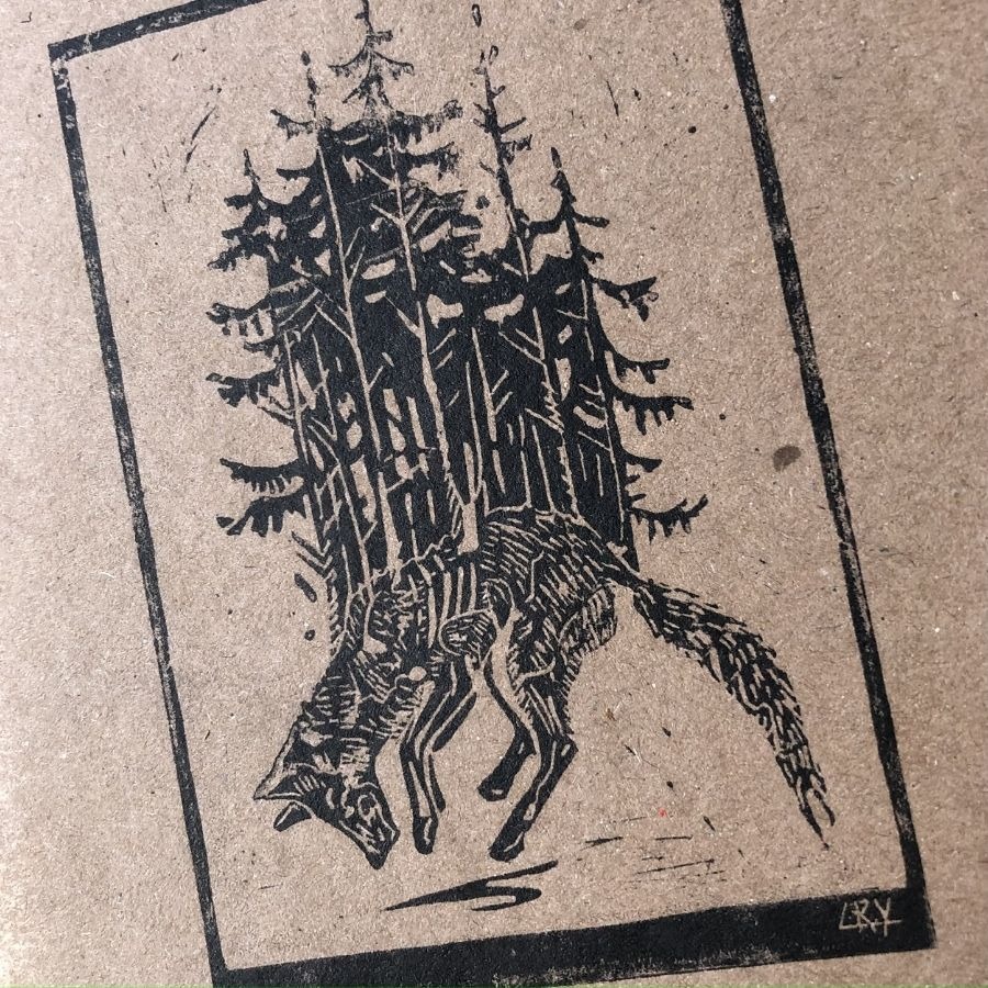 Woodcut print of a wolf with trees on a brown background.